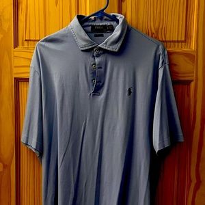 Used Beautiful baby blue powder polo shirt.